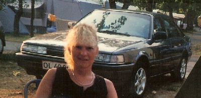 Koksgrå Mazda 626 2.2